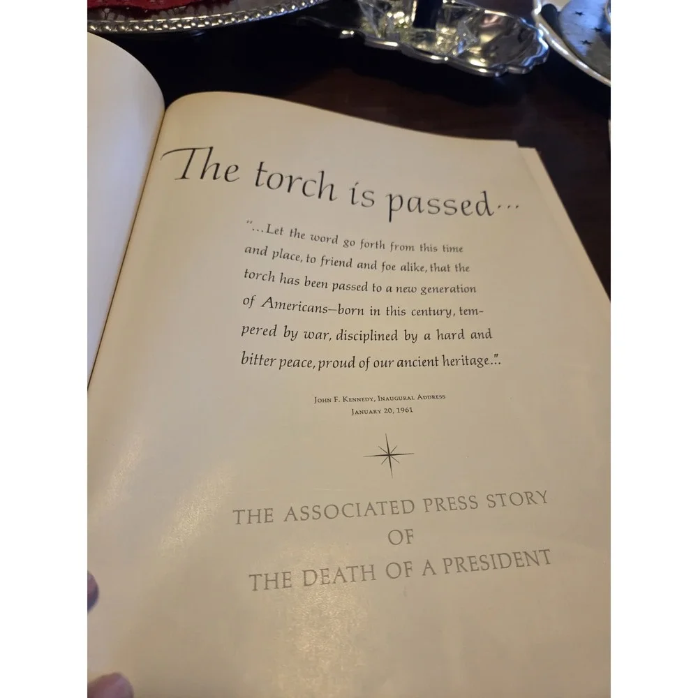 vintage 1963 hardcover book titled The Torch President John F Kennedy